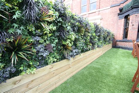 outdoor artificial greenery wall.